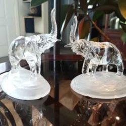 A pair of glass elephants