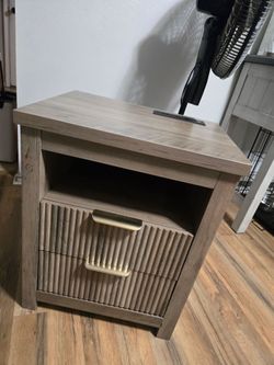 Night stand with outlet