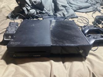 Xbox One Console plus two controls and cooling pad