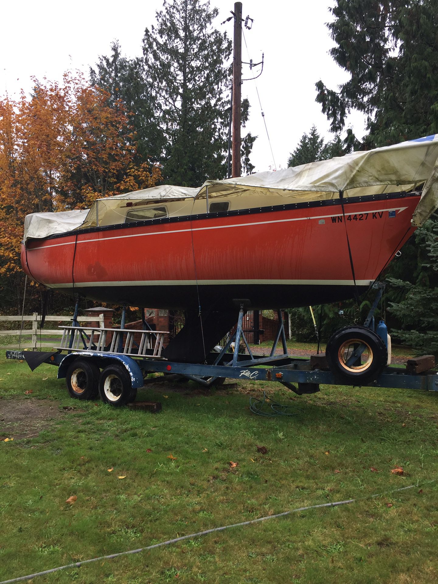 26 foot 1977 San Juan sailboat and trailer. Has a small one cylinder diesel inboard. 2 sails. selling as is