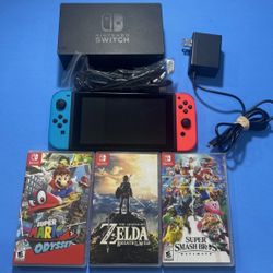 Nintendo Switch with Neon Blue and Neon Red Joy Con Bundle Complete With Games