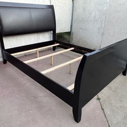 Solid wood queen bed frame in good condition