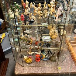 Lots of small figures dishes, glasses vases crystal