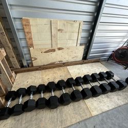 New pair of 25,30,45,50,55 and 60lb rubber dumbbells NEW IN BOX $530