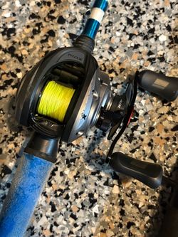Abu Garcia Max bait caster with a bunch of extras!