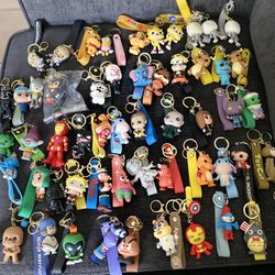 LLAVEROS DE DIFERENTES PERSONAJES/ CADA JNO CUESTA 