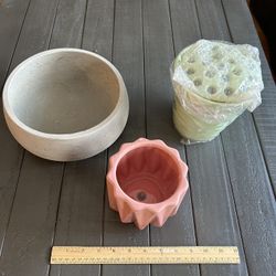 One shallow planter, one flower arranging vase (brand new), and one planter pot
