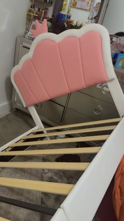 Pink and white Queen Twin bed