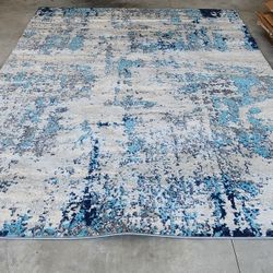7' 10" × 10' 3" Area Rug