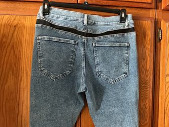 Light Wash Jeans with Black Waistband Detail