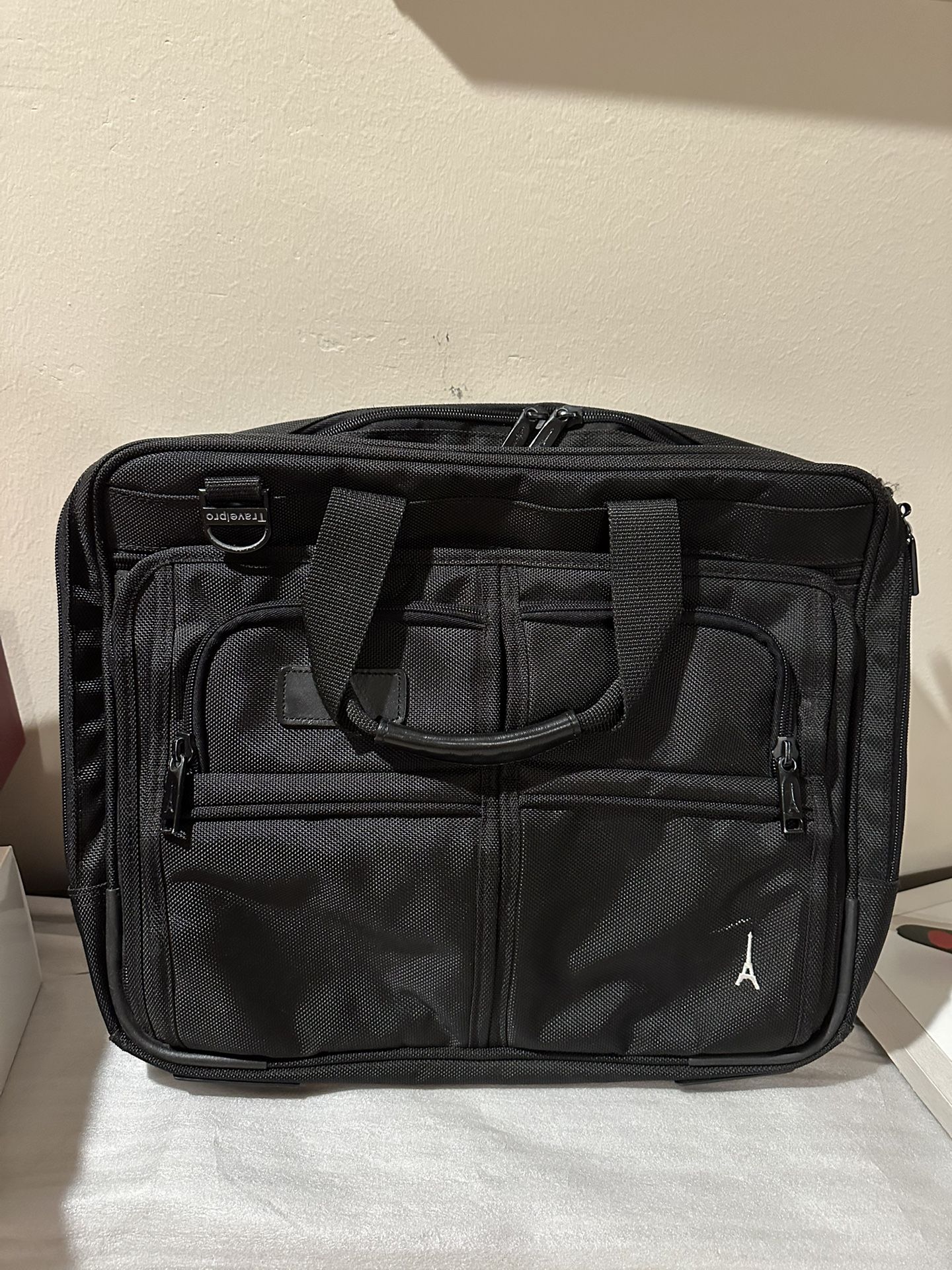 Travelpro Black Tote/Laptop/Travel bag with strap, expandable 17"x12" x 4"- expandable to 6"