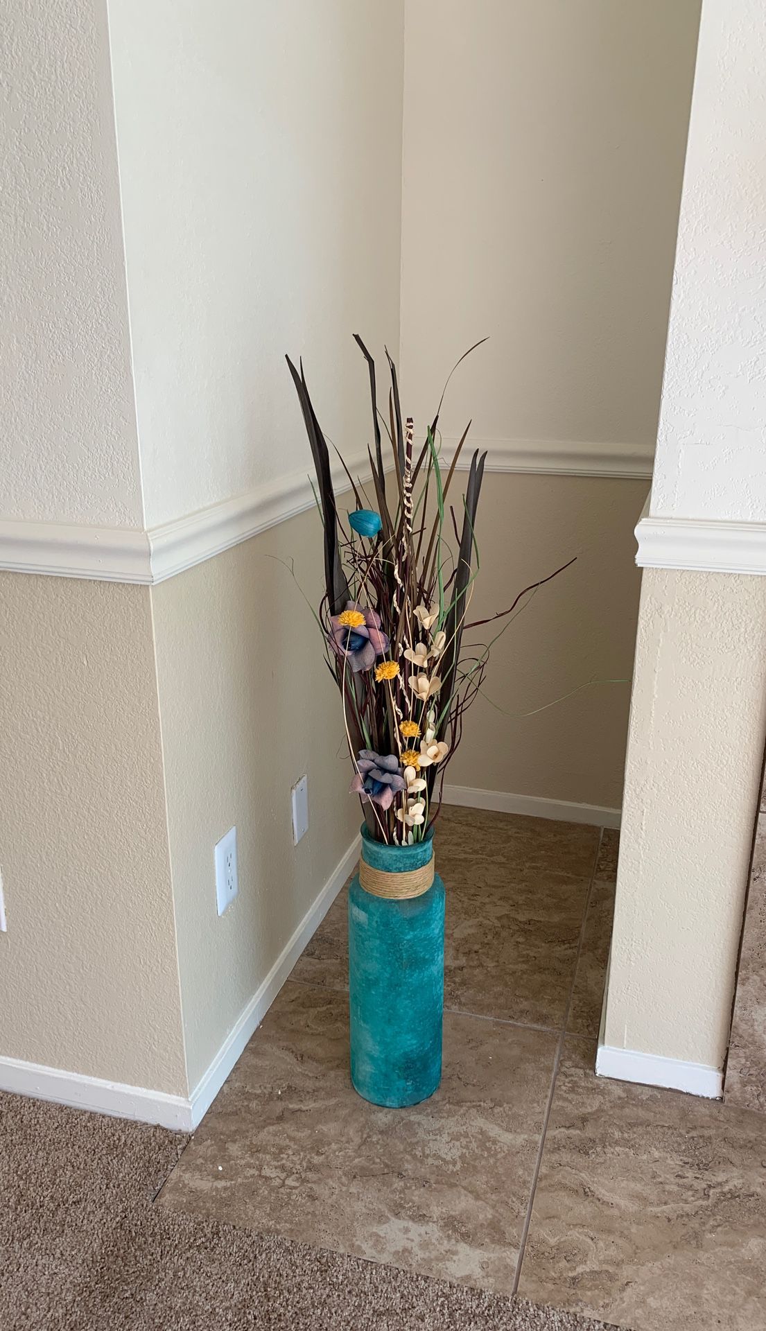 Decorative vase with synthetic flowers