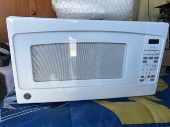 New GE Counter Top Microwave New