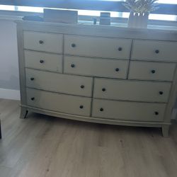 Dresser  paired with two matching nightstands