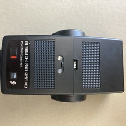 Vivitar 283 Auto Thyristor Flash, a bounce head capable of 90° rotation and automatic exposure