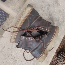 Men's steel toe boots wolverines 8 and 1/2 used