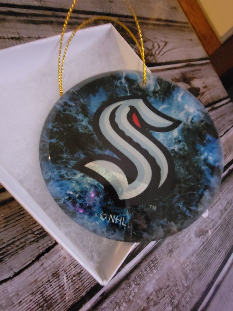 Seattle Kraken NHL glass ornament.