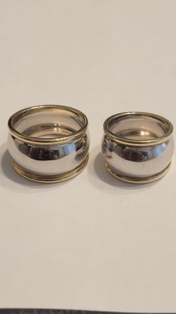 Men's 14 karat white gold band ring size 9?   9g   and a woman gold band size 6 8g  $1,500.00 wedding set
