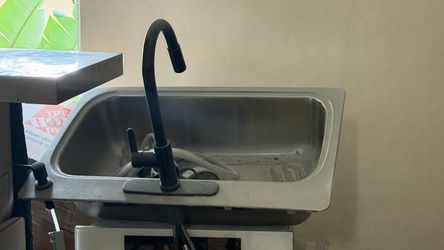 Sink with faucet