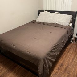IKEA Queen bed and mattress with mattress topper, night stand, dresser and side table