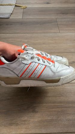 Adidas rivalry low orange unisex