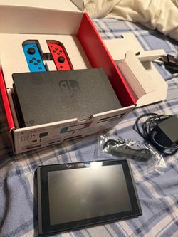 Nintendo Switch with Neon Joy-Cons and Accessories
