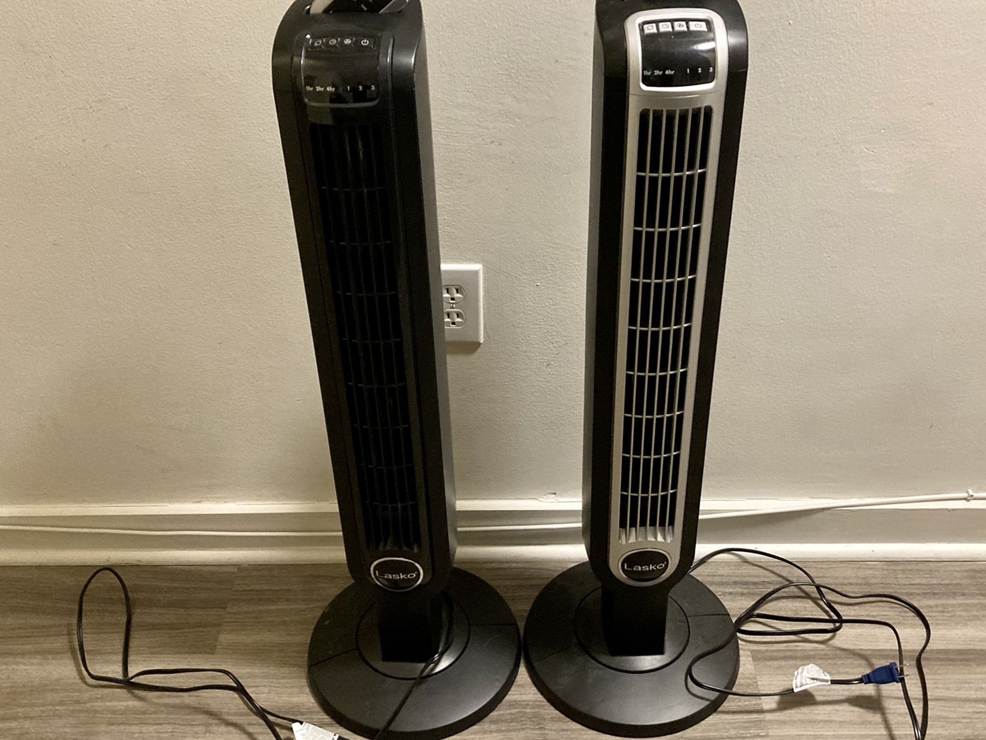 Lasko Tower Fans With Remotes (2)