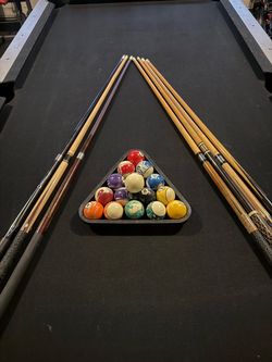 Pool Table with Cues and Ball Set
