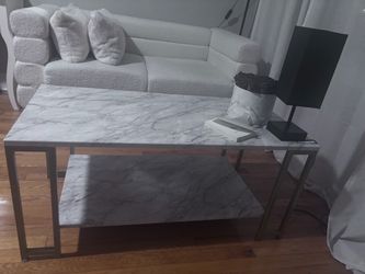 Grey/white marble coffee table with gold legs