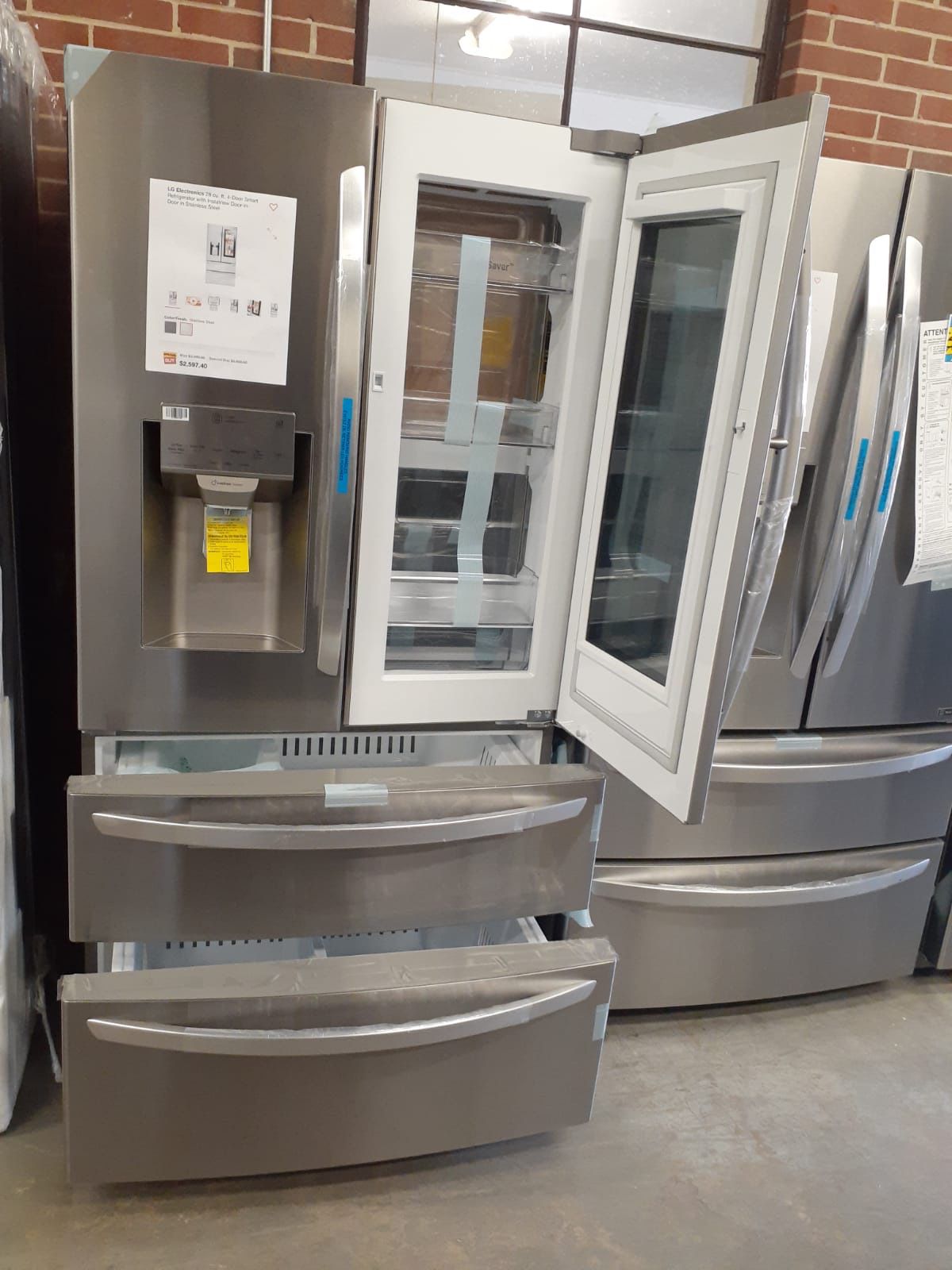 Brand new LG 4-doors refrigerator with instaview door in door and 2 freezer drawers