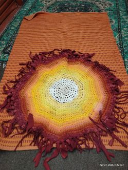 Sunburst hand woven rug
