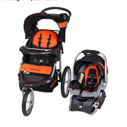infant car seat with base, stroller, and rain cover