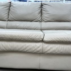 Cream Leather Sofa With Bed Underneath 175$ Obo 