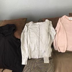 Girls XL Sweaters. Location West Lancaster, CA