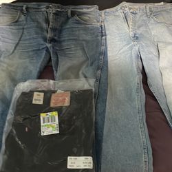 Assortment of New & used jeans & cargo shorts size 38 & 36 waist