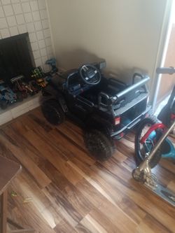 MP3 PowerWheels 4 Wheel Drive with 2 Speeds and Remote Control