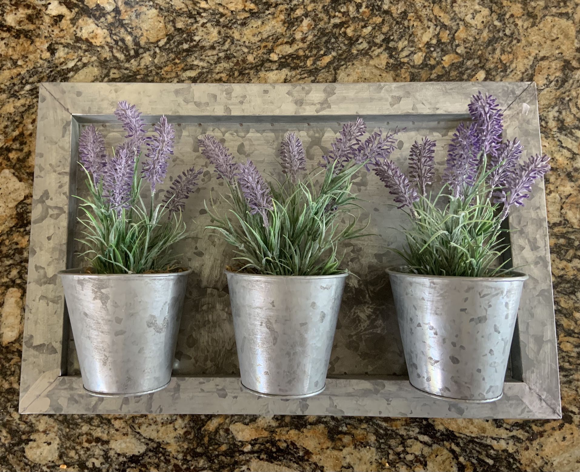 Wall hanged fake lavender plants frame
