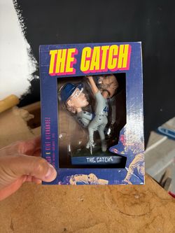 The catch dodger bobble head