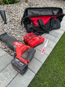 Milwaukee Sawzaw  with battery and charger