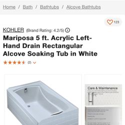 New white Kohler Soaking bathtub 