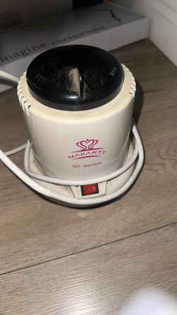 Nail tool sterilizer
