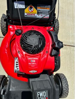 Craftsman self-propelled lawnmower in excellent condition starts right up runs perfect. Was stored for years.  Truly like new.