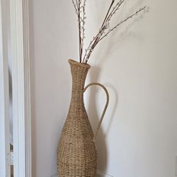 bohemian-style rattan floor vase.