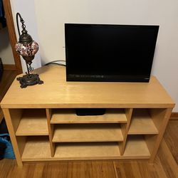 Blonde mid-sized TV stand