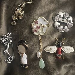 Woman’s Brooches