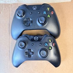 Three Xbox controllers for sale