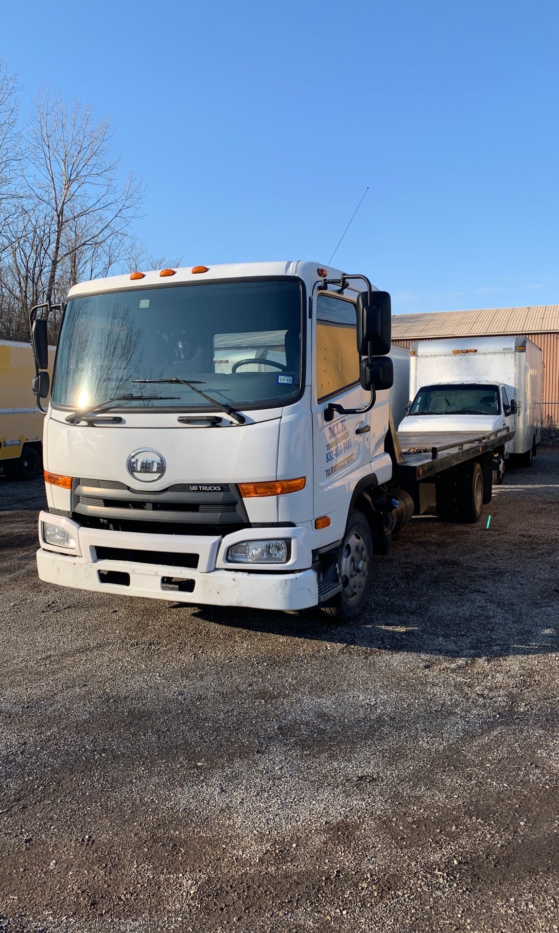 2012 UD 2300 tow truck roll back
