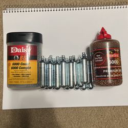 21 Co2 Cartridges And Some BBs