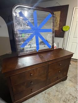 Wooden dresser with mirror