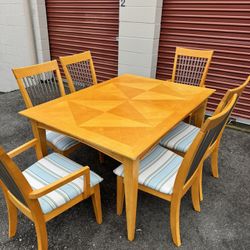 Wooden table and six chairs